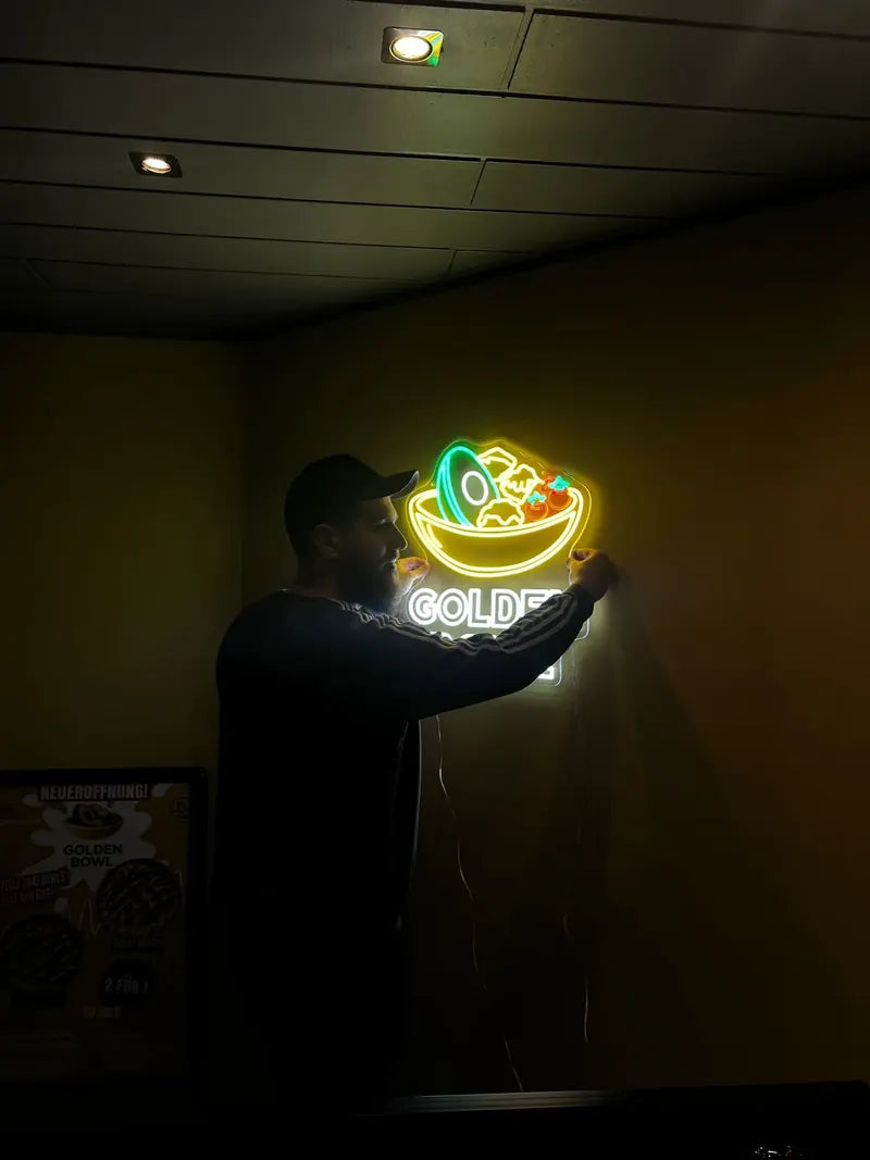 Montage des beleuchteten Golden-Bowl-Logos